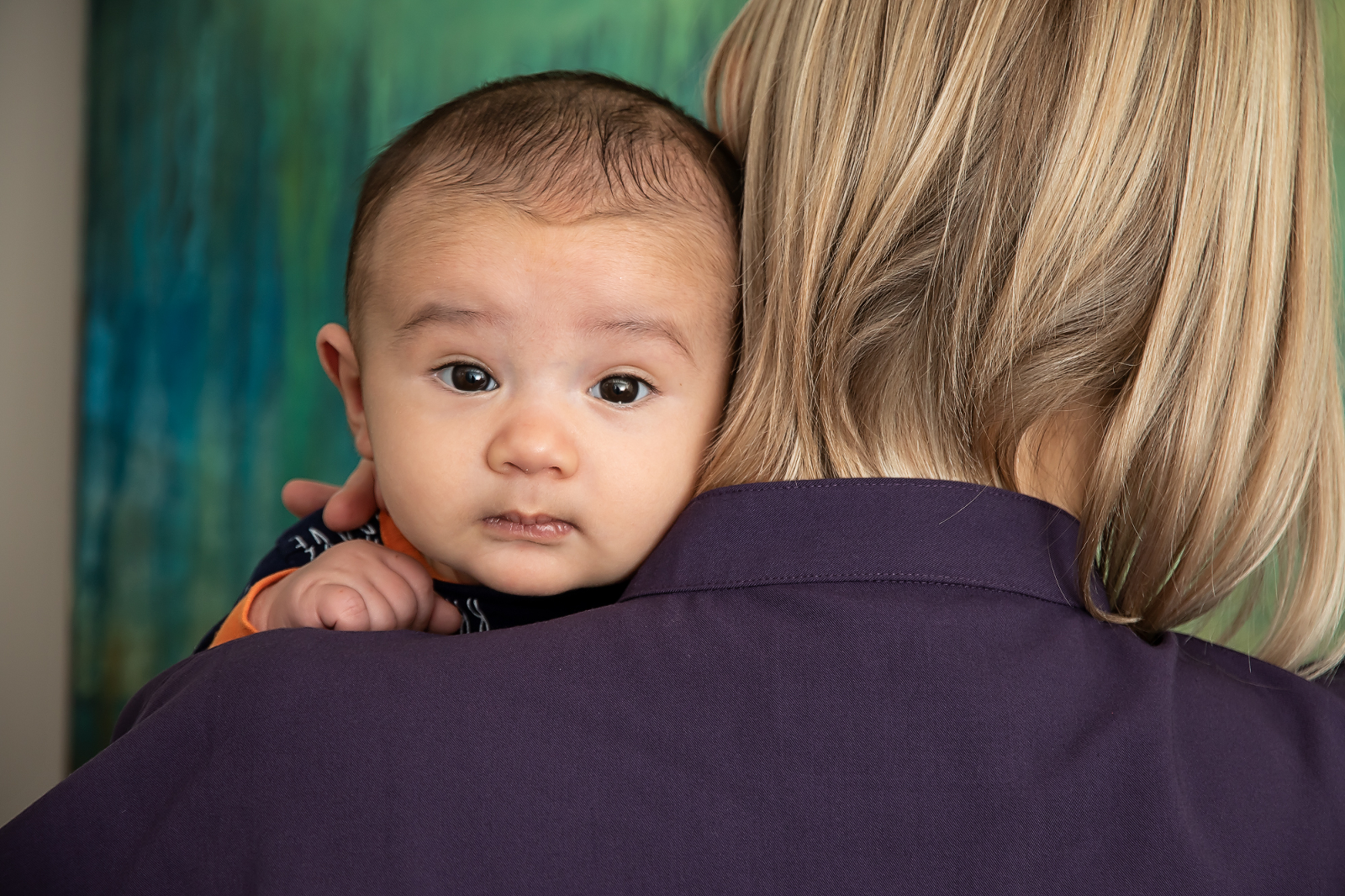 Infant receives Manual Osteopathic Therapy