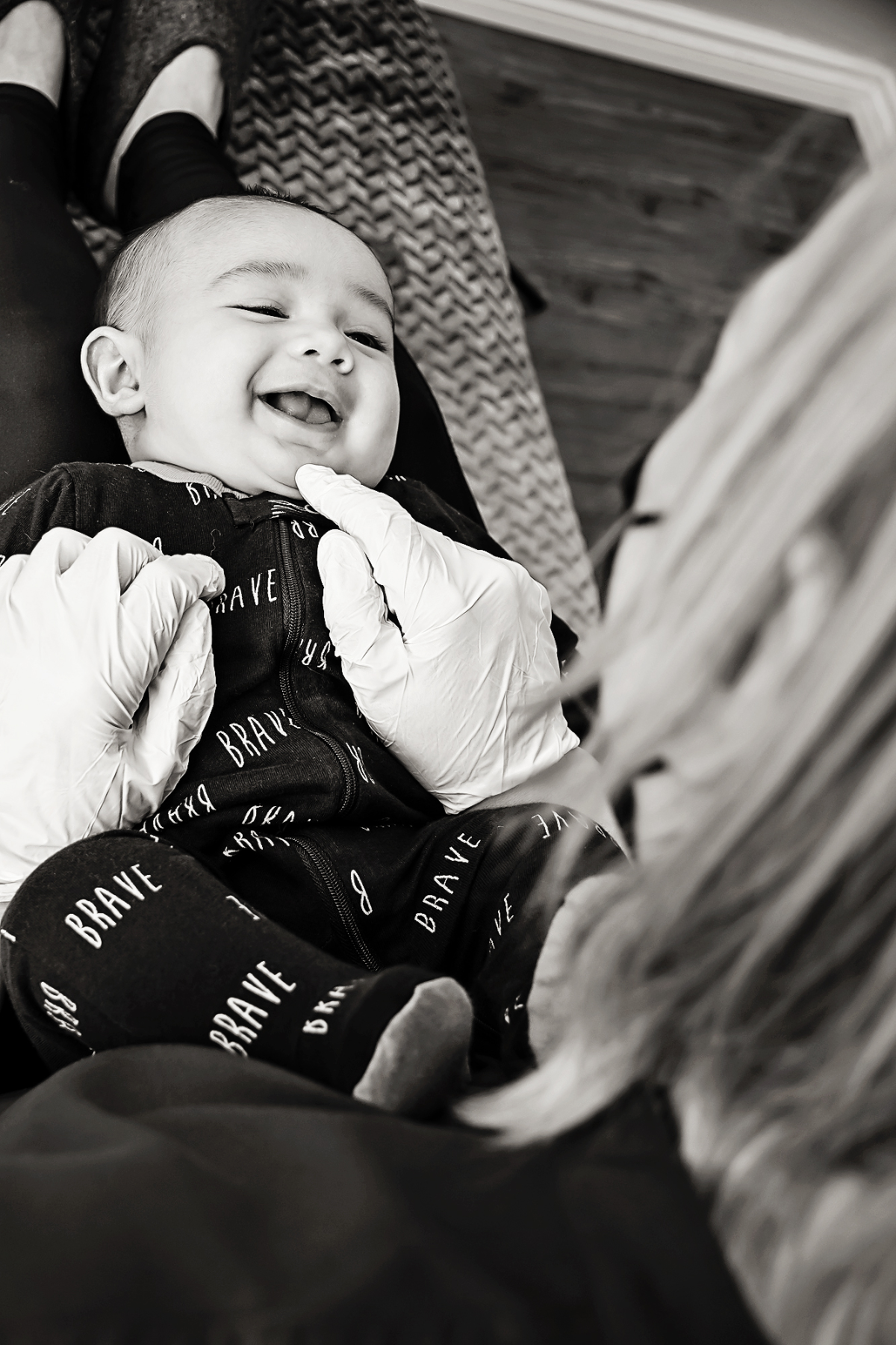 Infant receives Manual Osteopathic Therapy